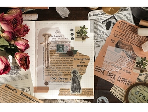 Detailed flat lay of vintage scrapbooking papers with old newspaper textures and botanical motifs