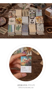 Macro-detail van vintage mini-stickerdozen met botanische en vlinderthema's