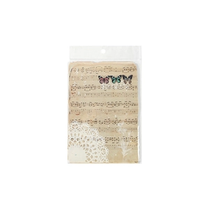 Vintage scrapbooking material set with music notes and floral patterns on kraft paper