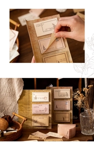 Nahaufnahme von dekorativem Vintage-Papier und Stickern für DIY-Scrapbooking-Projekte