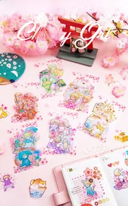 Detail of waterproof PET stickers featuring cherry blossom girls and Japanese anime motifs