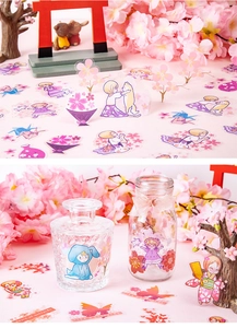 Detail of PET stickers featuring sakura girls and butterfly patterns for DIY scrapbooking