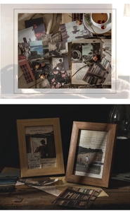 Detail of vintage postcard set and wooden frames with rustic bookish decor aesthetics