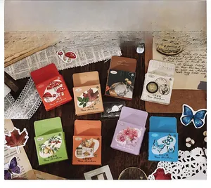 Detailed close-up of vintage decorative stickers with nature motifs and retro elements