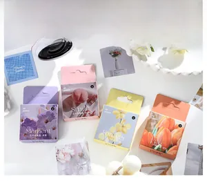 Detailed view of floral sticker box set featuring four color themes for journaling decor