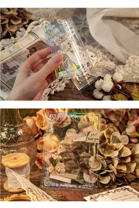 Close-up of vintage PET collage card with holographic gold stamping and floral motifs