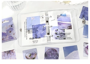 Close-up of violet floral stickers and PVC mini binder from the Infeel.me stationery set