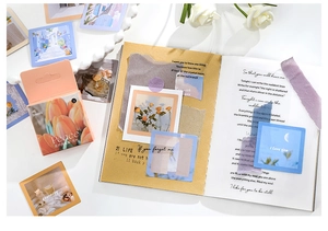 Detail of floral and landscape decorative stickers for journaling in a scenic setup