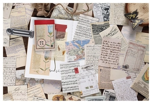 Macro view of vintage washi sticker book featuring blue floral cover and nostalgic paper