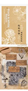 Detailed view of botanical vellum stickers with vintage plant line art on rustic background