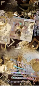 Detail of vintage gold-stamped lace paper with butterfly and floral hollow patterns