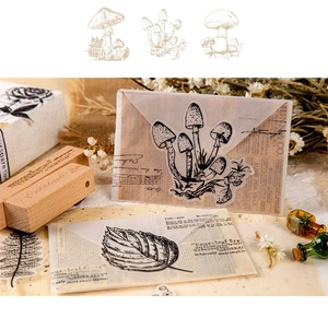 Close-up of translucent vellum stickers with vintage black and white plant line art
