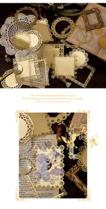 Macro detail of vintage gold foil hollow lace paper frames for journaling decoration