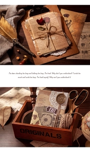 Detailansicht eines Vintage-Briefpapier-Sets mit Federkiel und Siegelstempel aus Wachs