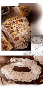 Detailansicht von Vintage-Scrapbook-Papier mit Spitzen-Ausschnitten und Pilzmotiven