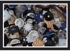 Macro view of vintage galaxy theme stickers with planet designs and moon phases