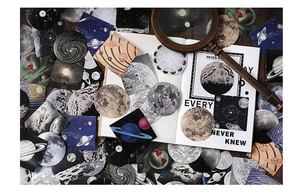 Macro view of vintage astronomy stickers featuring moon phases and celestial maps