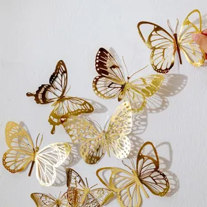 Elegant 3D gold hollow butterfly wall stickers with metallic texture for creative home decor