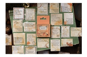 Macro view of vintage coffee-themed paper stickers on a dark green retro ledger