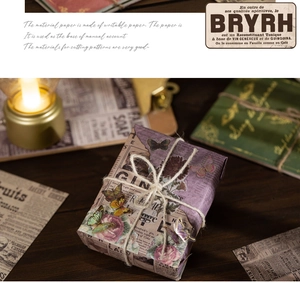 Papier de scrapbooking vintage avec motifs papillons et roses emballé de ficelle