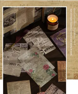 Détail de 30 feuilles de papier scrapbooking vintage aux motifs journaux et fleurs