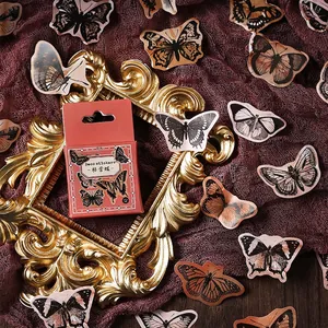 Vintage butterfly decorative stickers in an elegant gold frame for DIY journaling