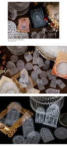 Macro shot of vintage style white ink PET stickers with European window and floral designs