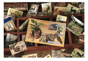Vintage washi sticker set featuring realistic animals and floral motifs for DIY journals