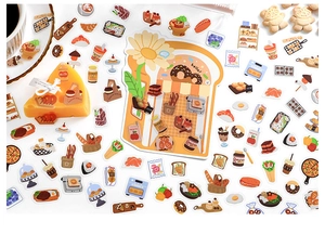 Detail showing cartoon food PET stickers with cakes, coffee and hand-drawn desserts