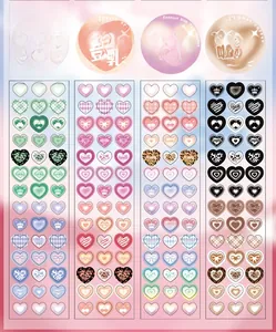 Detail of laser-cut heart sticker sets in blueberry, cherry, coconut, and caramel tones