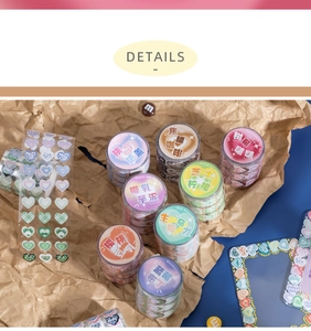 Detail of laser-cut heart tapes in colorful designs on rustic paper background