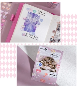 Holographic heart-shaped stickers used for decorating scrapbooks and polaroid cards