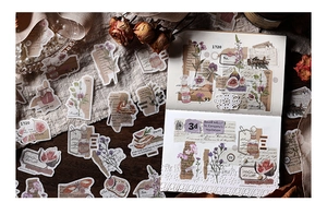 Détail d'autocollants washi vintage floraux pour décoration de carnet sur bois