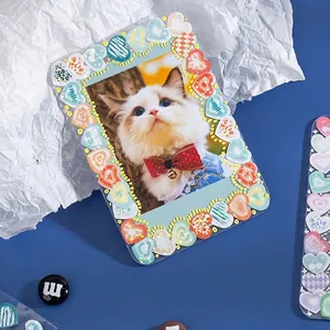 Laser-cut heart polaroid card protector with cat photo and decorative stickers
