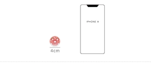 Detailed view of 4cm round strawberry dessert sticker with iPhone X size reference