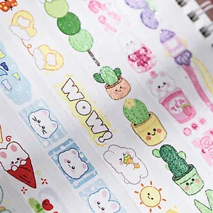 Glitter washi tape featuring hand-drawn cartoon desserts and cute animals on white paper