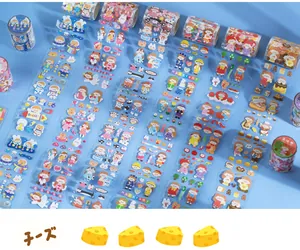 Flat lay of colorful cartoon PET tapes featuring cute girls and dessert illustrations