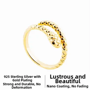 Macro detail of the golden S925 sterling silver ring featuring a snake scale texture