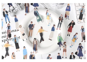 Macro view of hand-drawn fashion girl washi stickers for DIY journal decoration