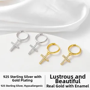 Detail view of S925 sterling silver cross earrings with sparkling zircon inlay