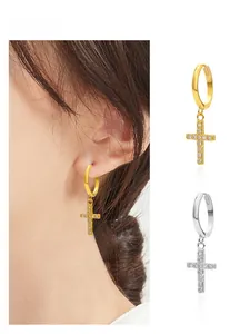 Detail view of S925 sterling silver cross hoop earrings in gold and silver plating