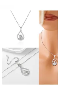 Close-up of S925 sterling silver stamp on water drop pendant with carved woman portrait
