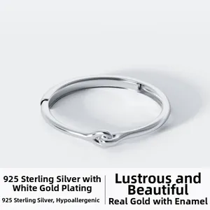 Detailed view of S925 sterling silver knotted open ring with platinum plated finish