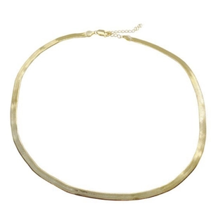 Detailed view of golden flat herringbone snake chain necklace with lobster clasp and extender