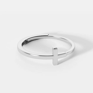 Minimalist silver cross open ring with polished metal finish in a sleek adjustable design