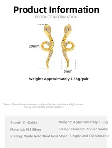 Detailed view of snake-shaped silver earrings with size and weight specifications