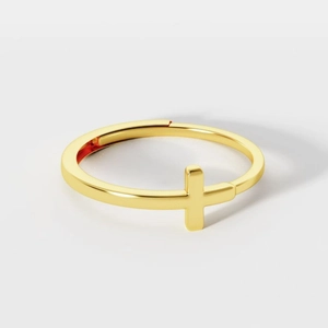 Minimalist gold-plated cross open ring with an adjustable band on a white background