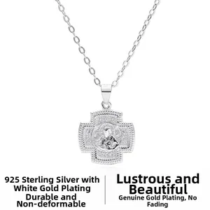 Detail view of 925 sterling silver crucifix pendant with religious embossed engraving