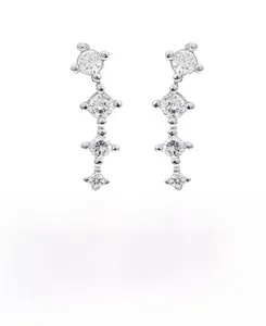 Detail view of 925 sterling silver linear earrings with five sparkling round zircons each