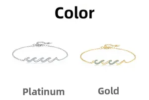 Detail of wave-shaped S925 silver bracelets in gold and silver with zircon insets